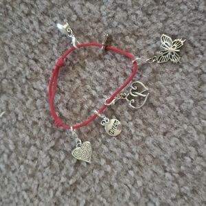 Uno de 50 red rope adjustable charm bracelet